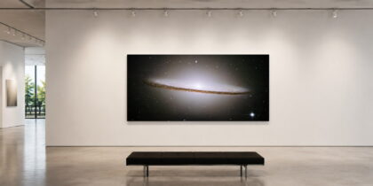 Sombrero Galaxy (M104) 30 x 60 glossy aluminum print shown to scale in a white gallery